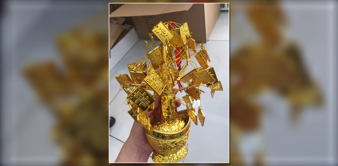 Tổng Đài Liên Hệ EMS Bưu Điện Việt Nam – Kênh Hỗ Trợ Chính Thức Và Đáng Tin Cậy - Cây tài lộc trang trí màu vàng